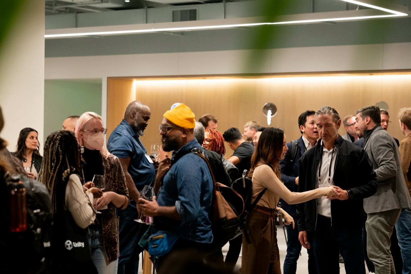 A full room mingling after a talk
